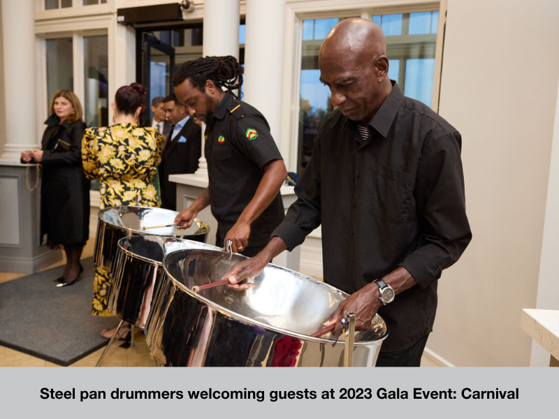 Photo of two men drumming at Carnival Extravaganza
