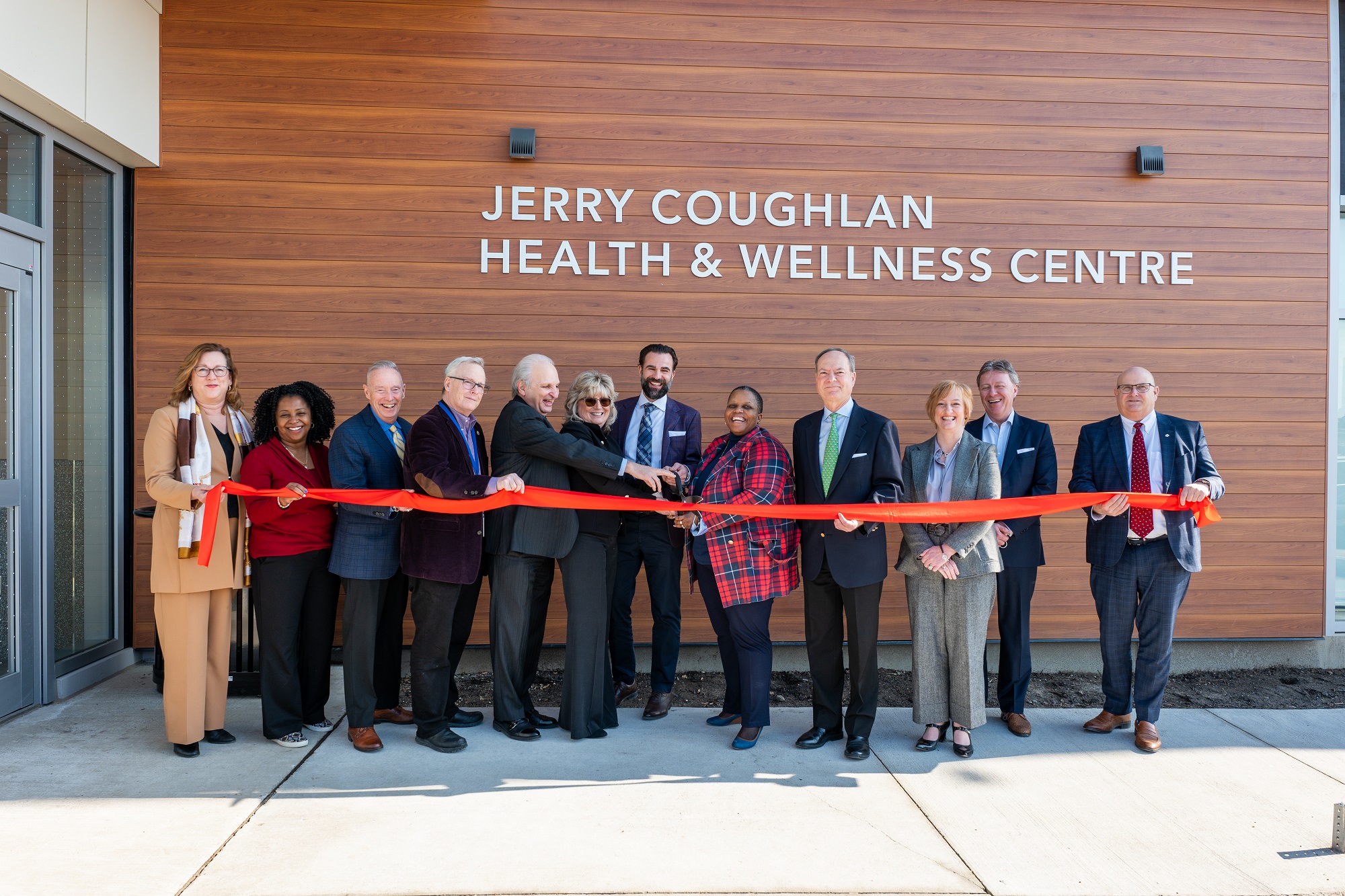 Photo of community members, staff, local leaders, and generous donors celebrated the historic grand opening of the Jerry Coughlan Health & Wellness Centre on February 23, 2024. 