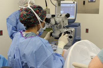 Surgeon performing eye surgery