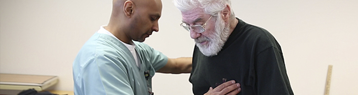 Occupational Therapist works with stroke patient