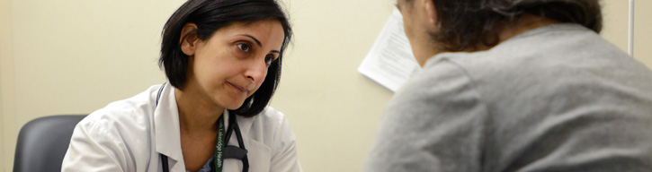 Doctor speaking with patient