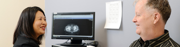 doctor talking to a patient in an office