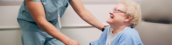 Nurse with a smiling elderly patient