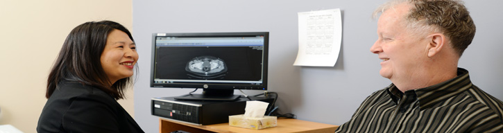 doctor talking to a patient in an office